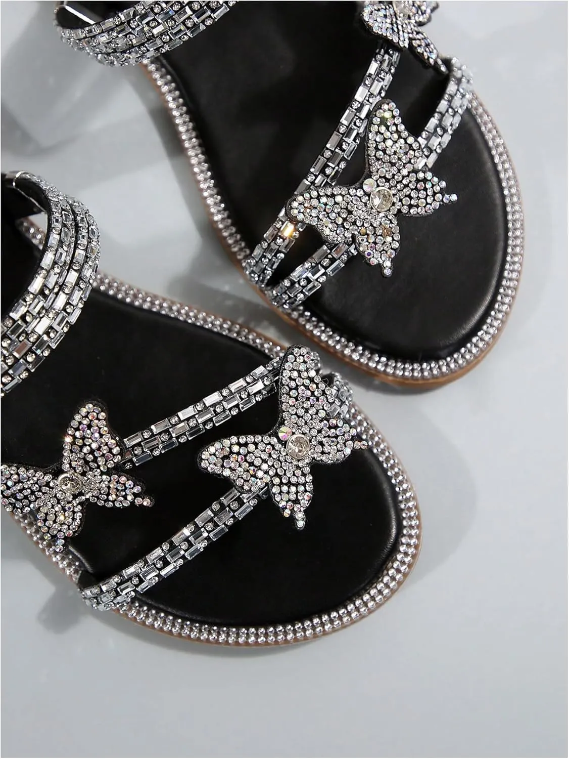 OYOANGLE Women's PU Leather Rhinestone Sandals Butterfly Strappy Flat Open Toe Elegant Slides Sandals